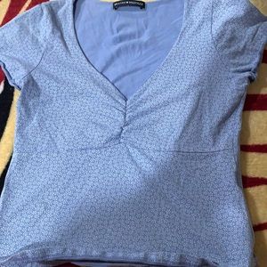Brandi Melville top. Teens love this brand